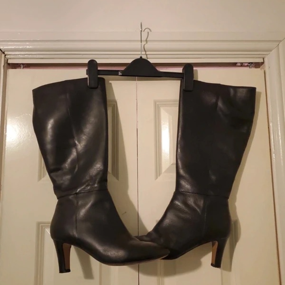Sleek Black Leather Heeled Boots